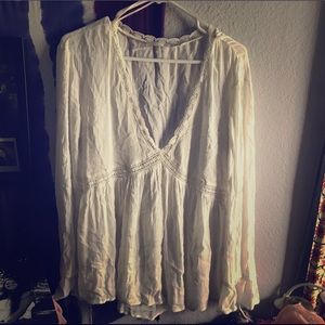 Zara; White V-neck flowy blouse.